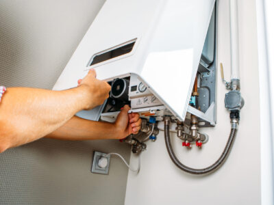 Plumber attaches Trying To Fix the Problem with the Residential